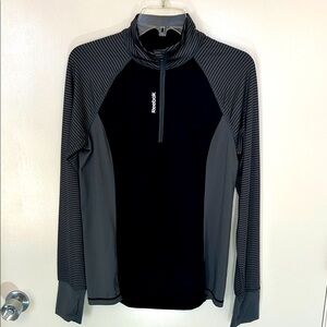 Reebok Black and Gray 1/4 zip top with striped keyhole sleeves, size M